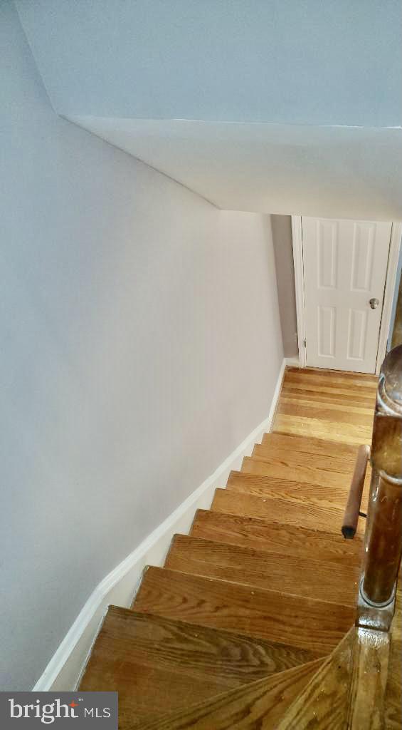 6210 Falkirk Road Baltimore, MD 21239 - Photo 20 of 22 Stairs to unfinished basement