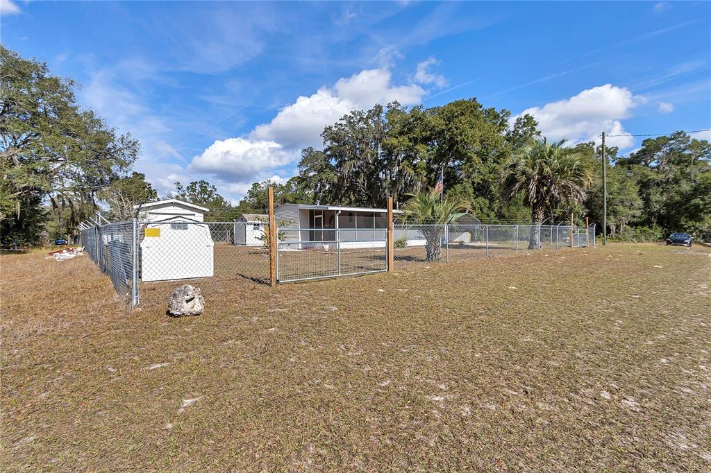 3003 Northeast 165th Lane Citra, FL 32113 - Photo 4 of 40 a house view with a outdoor space