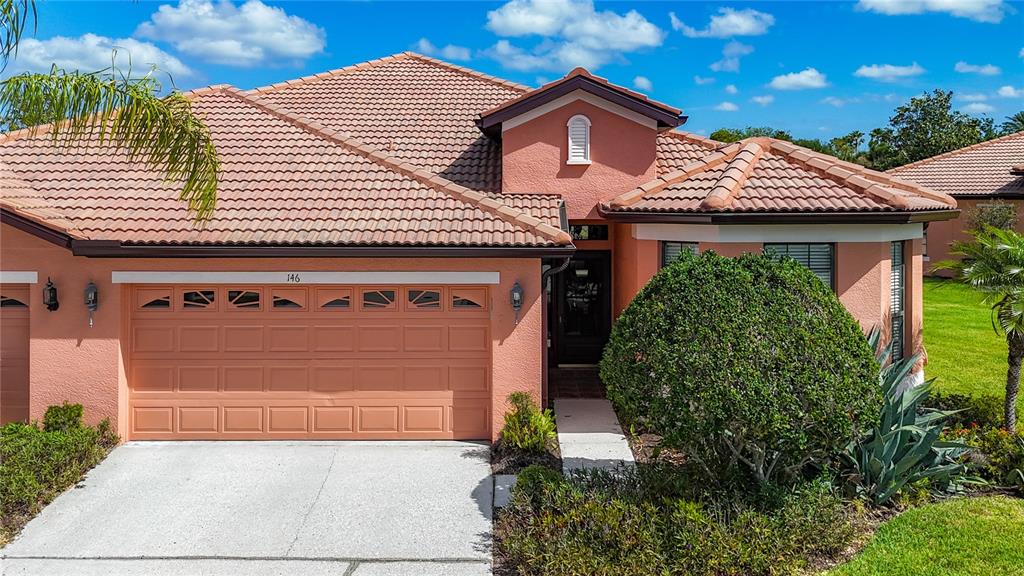 146 Shell Falls Drive Apollo Beach, FL 33572 - Photo 1 of 1 a front view of a house with a yard