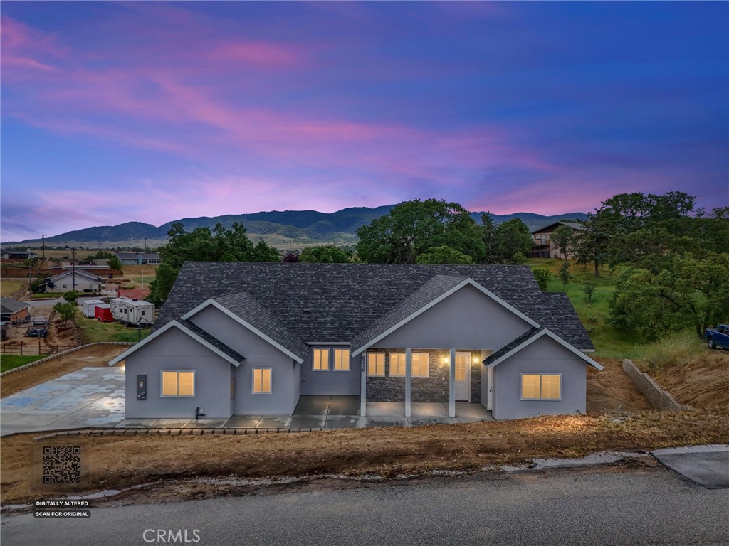 21116 Stage Drive Tehachapi, CA 93561 - Photo 1 of 46 a front view of a house with a yard and mountain view