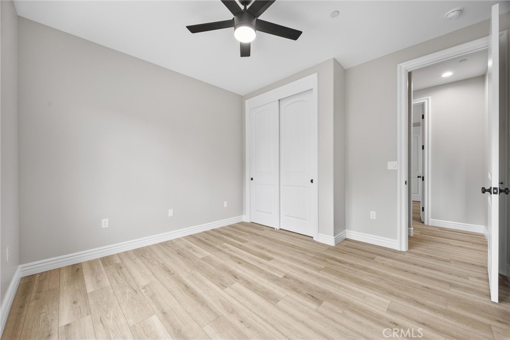 21116 Stage Drive Tehachapi, CA 93561 - Photo 34 of 46 wooden floor in an empty room with a window