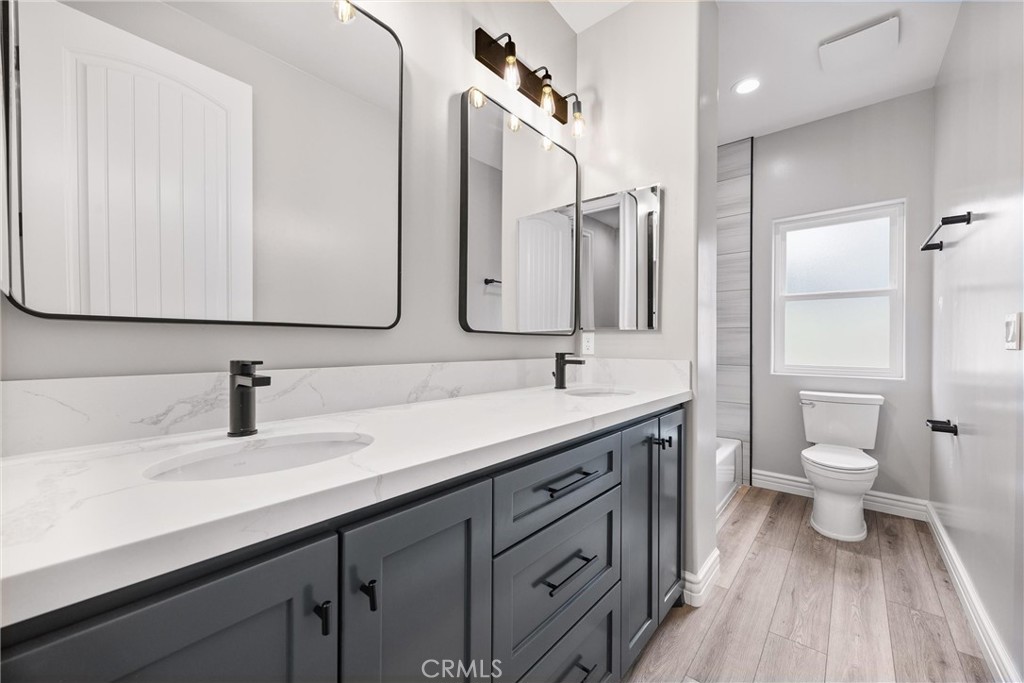 21116 Stage Drive Tehachapi, CA 93561 - Photo 38 of 46 a bathroom with a sink and a mirror