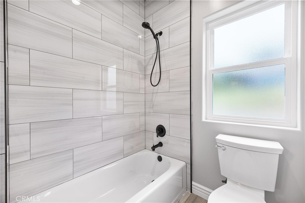 21116 Stage Drive Tehachapi, CA 93561 - Photo 39 of 46 a bathroom with a toilet and shower