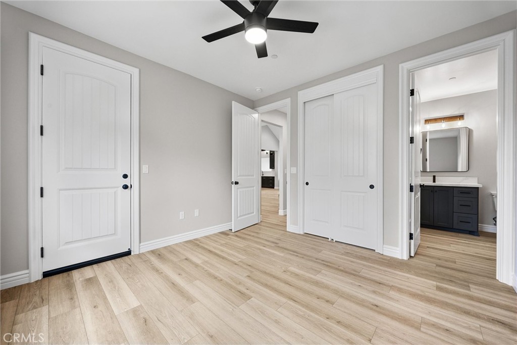 21116 Stage Drive Tehachapi, CA 93561 - Photo 41 of 46 a view of empty room with wooden floor and ceiling fan