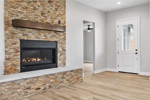 a living room with a fireplace