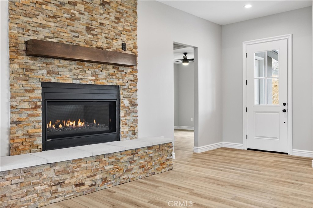 21116 Stage Drive Tehachapi, CA 93561 - Photo 10 of 46 a living room with a fireplace