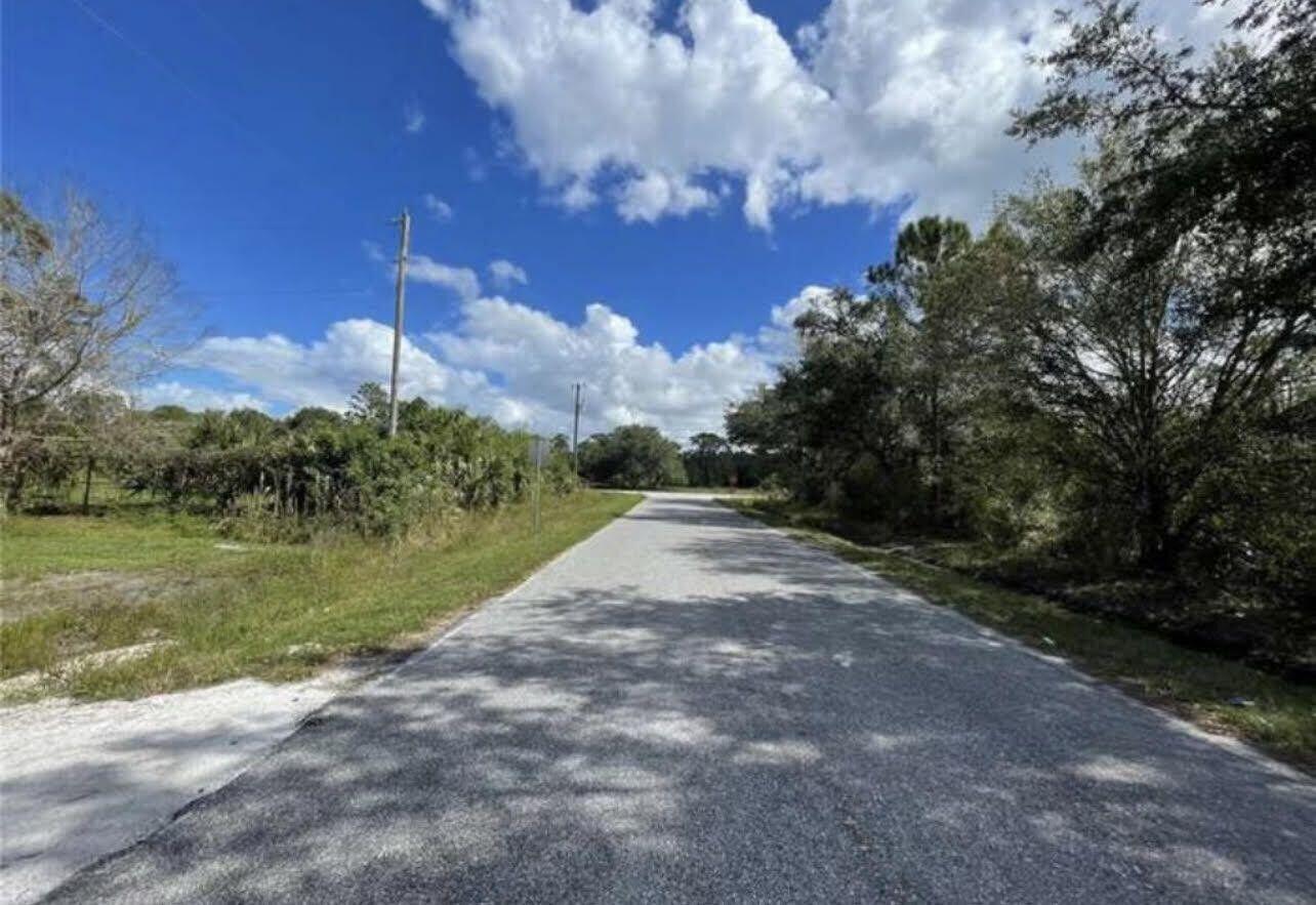 345 Northeast 106th Street Okeechobee, FL 34972 - Photo 2 of 3 a view of a yard with a yard