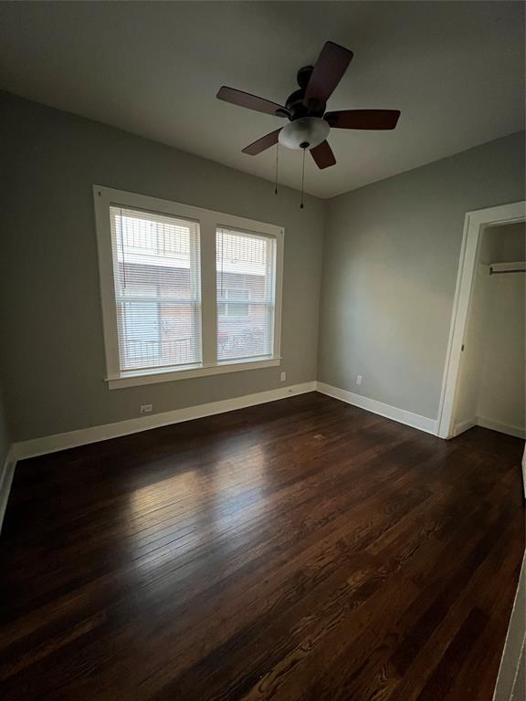 200 East 12th Street Dallas, TX 75203 - Photo 10 of 14 a view of a livingroom with wooden floor and a window