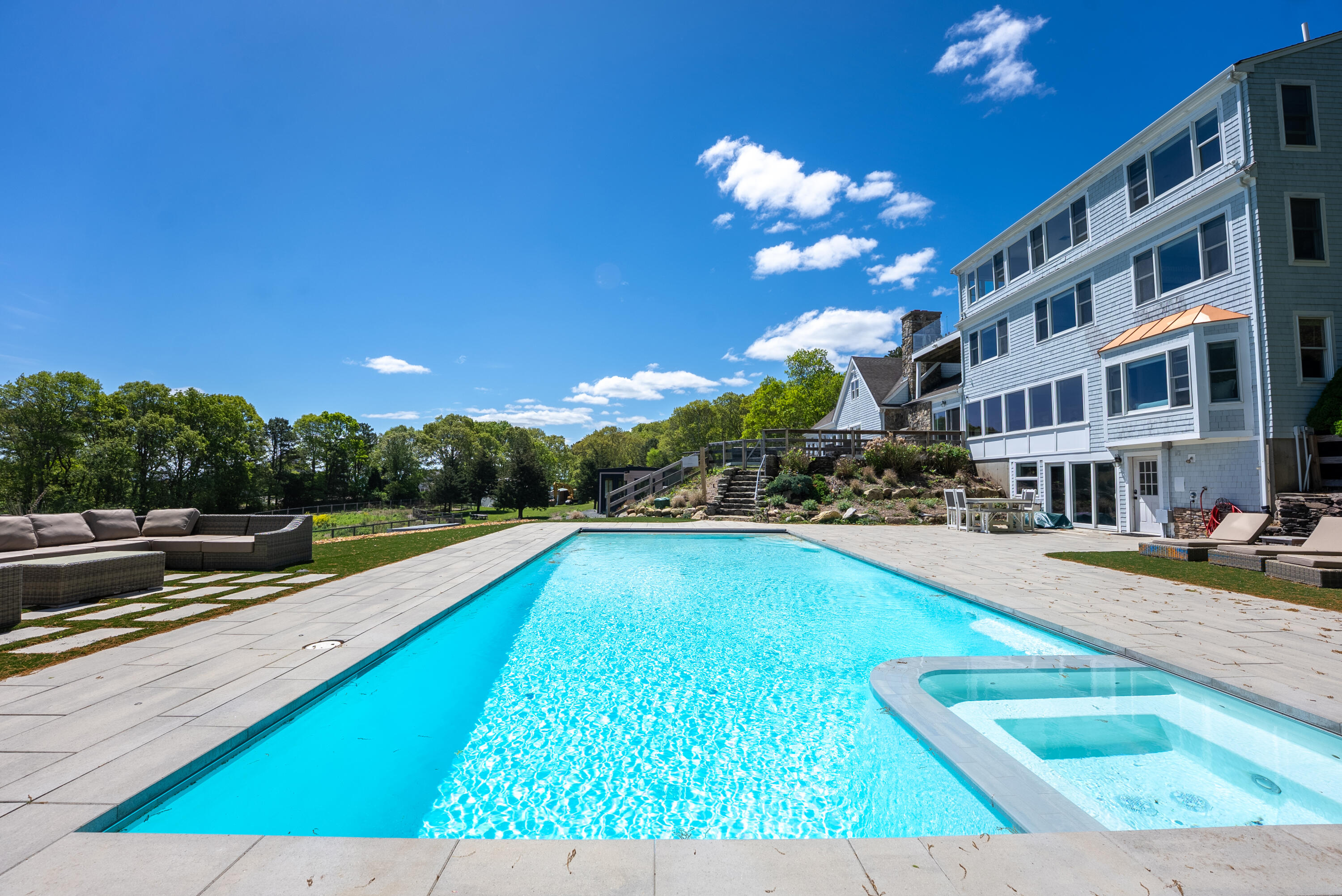 296 Center Hill Road Plymouth, MA 02360 - Photo 5 of 45 a view of a swimming pool with lounge chair