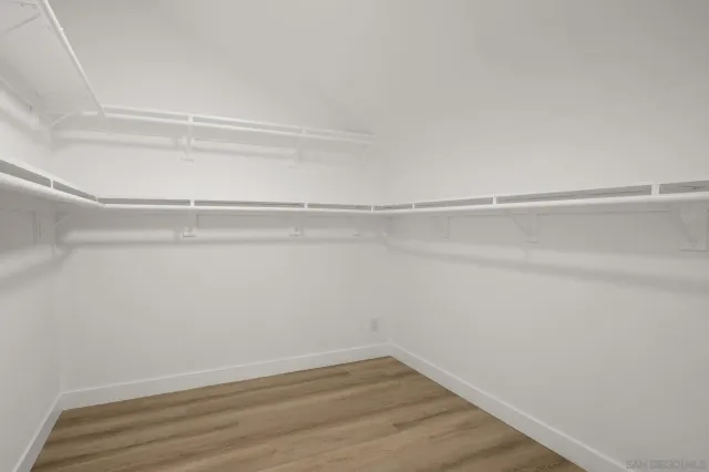 a view of an empty walk in closet