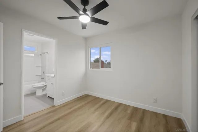 an empty room with a bathroom