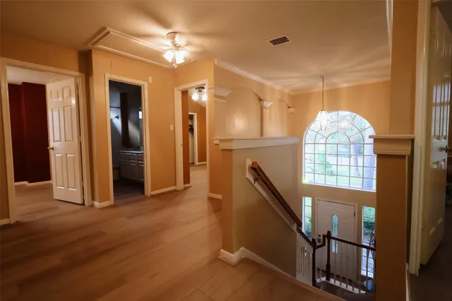 a view of entryway with wooden floor