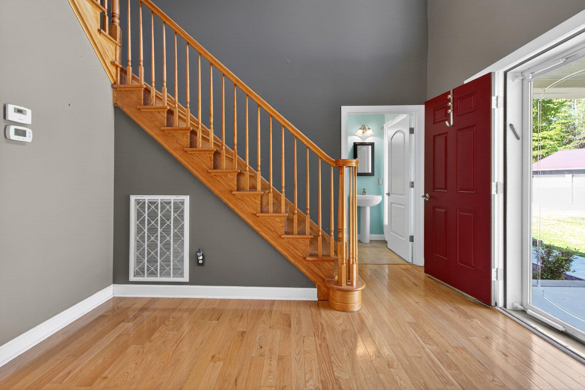 10878 Memory Road Harrington, DE 19952 - Photo 11 of 94 a view of an entryway with wooden floor and door