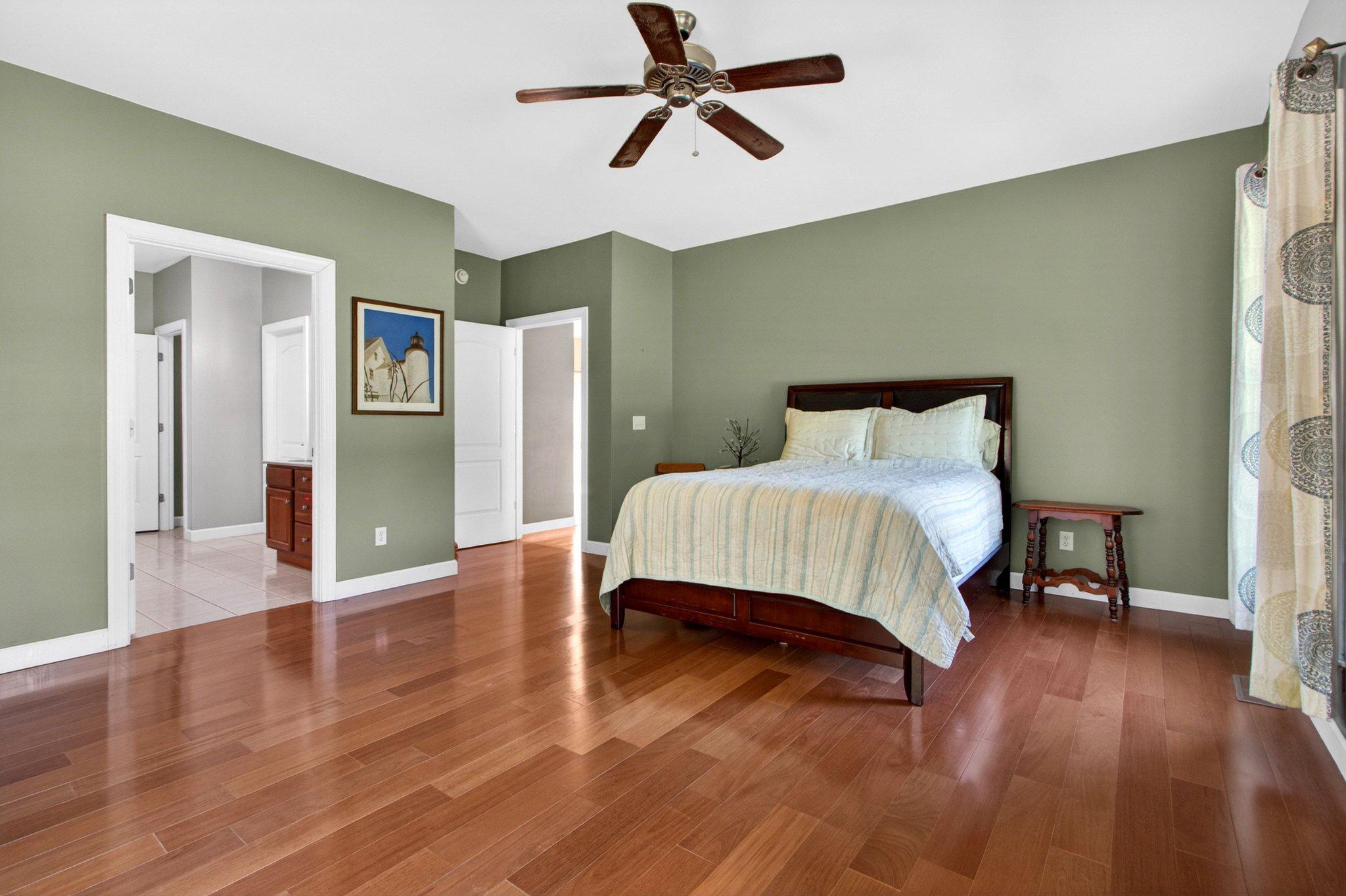10878 Memory Road Harrington, DE 19952 - Photo 17 of 94 Serene bedroom with warm wood floors.