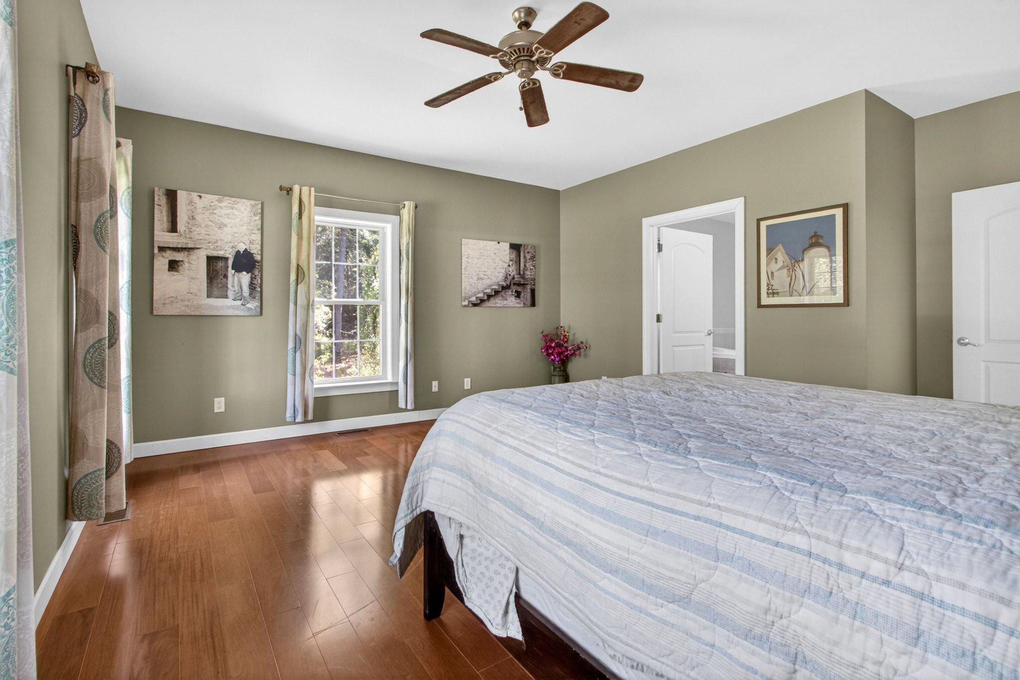 10878 Memory Road Harrington, DE 19952 - Photo 19 of 94 a bedroom with a bed and a window