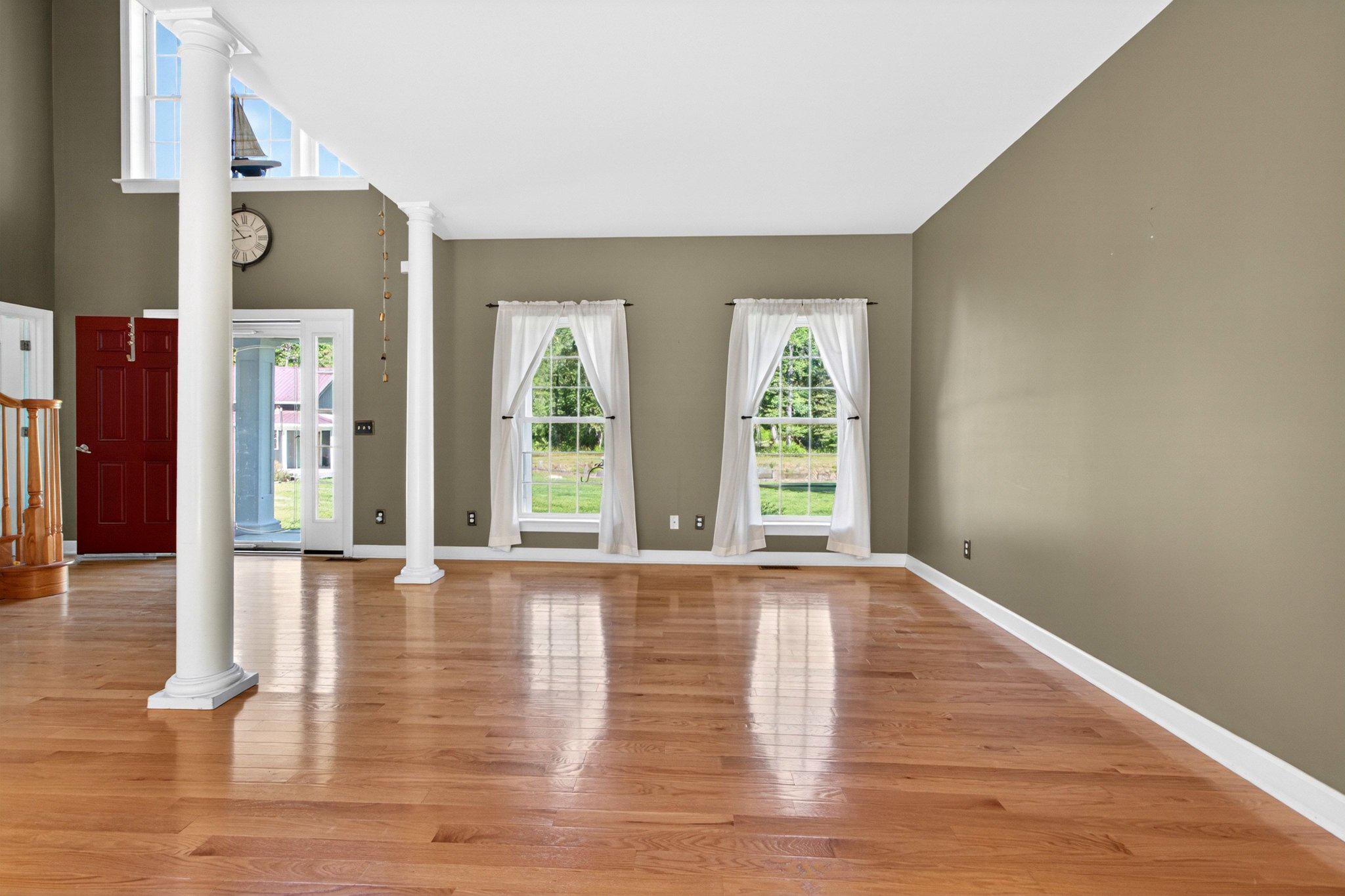10878 Memory Road Harrington, DE 19952 - Photo 23 of 94 a view of an entryway with wooden floor and windows