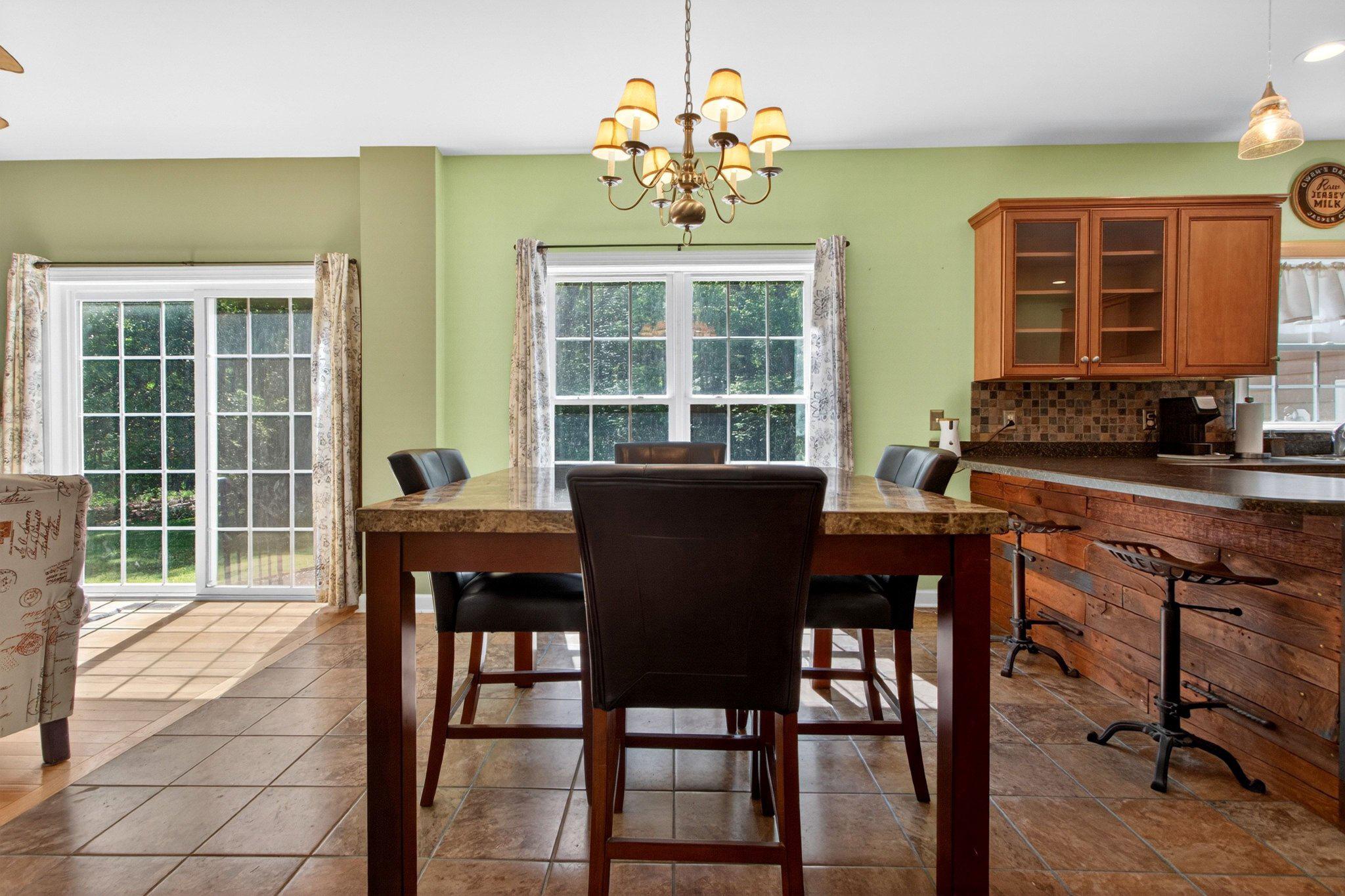 10878 Memory Road Harrington, DE 19952 - Photo 29 of 94 a view of a dining room with furniture window and outside view