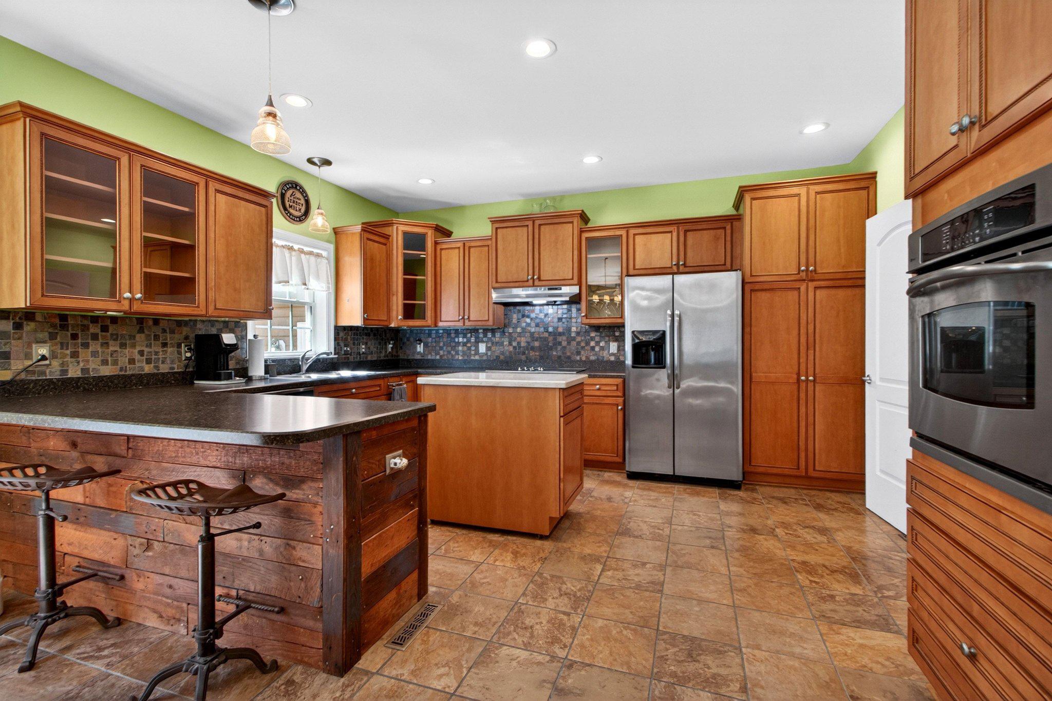 10878 Memory Road Harrington, DE 19952 - Photo 33 of 94 Warm and inviting kitchen space.