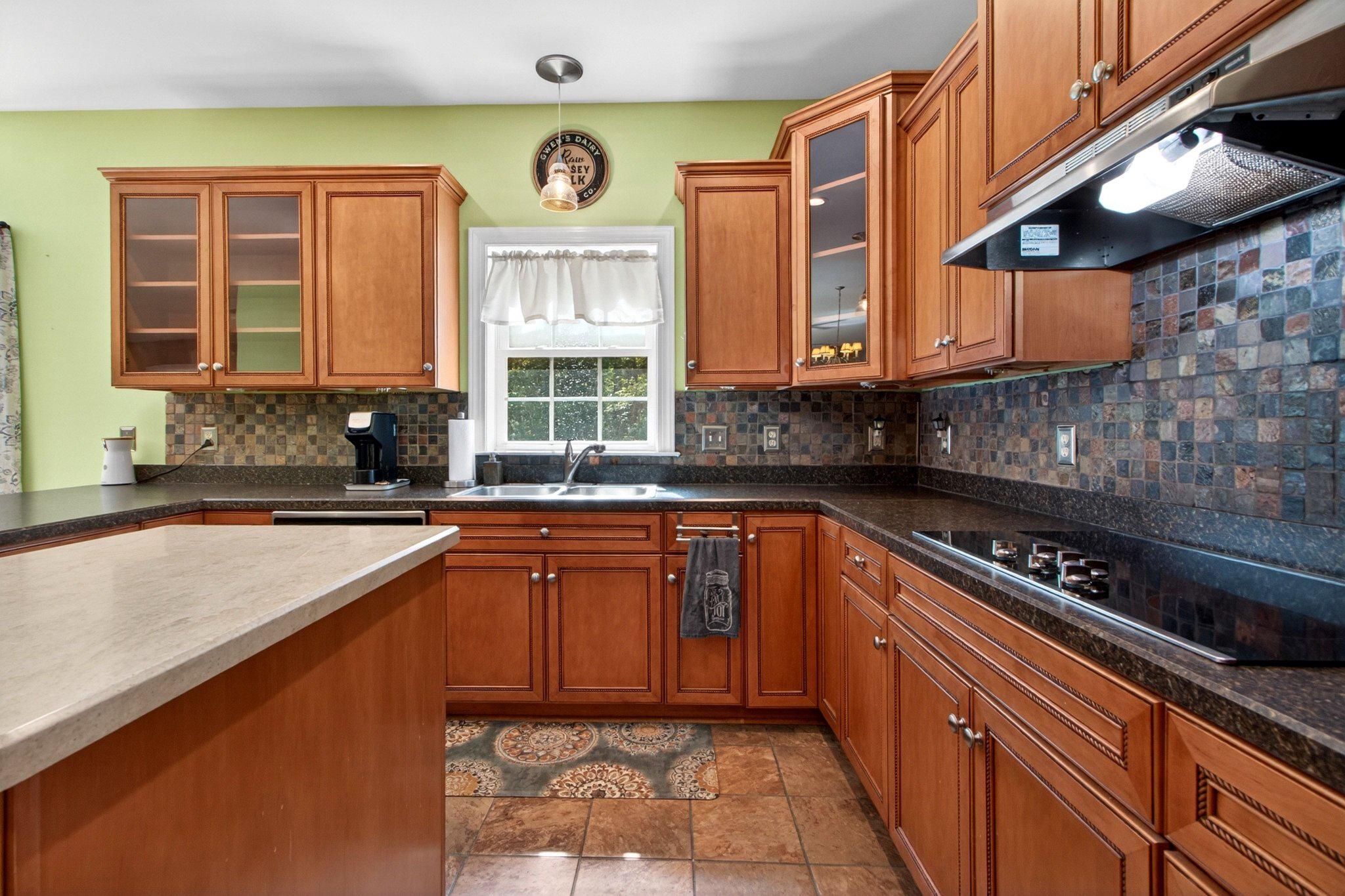 10878 Memory Road Harrington, DE 19952 - Photo 42 of 94 Charming kitchen with vibrant accents.