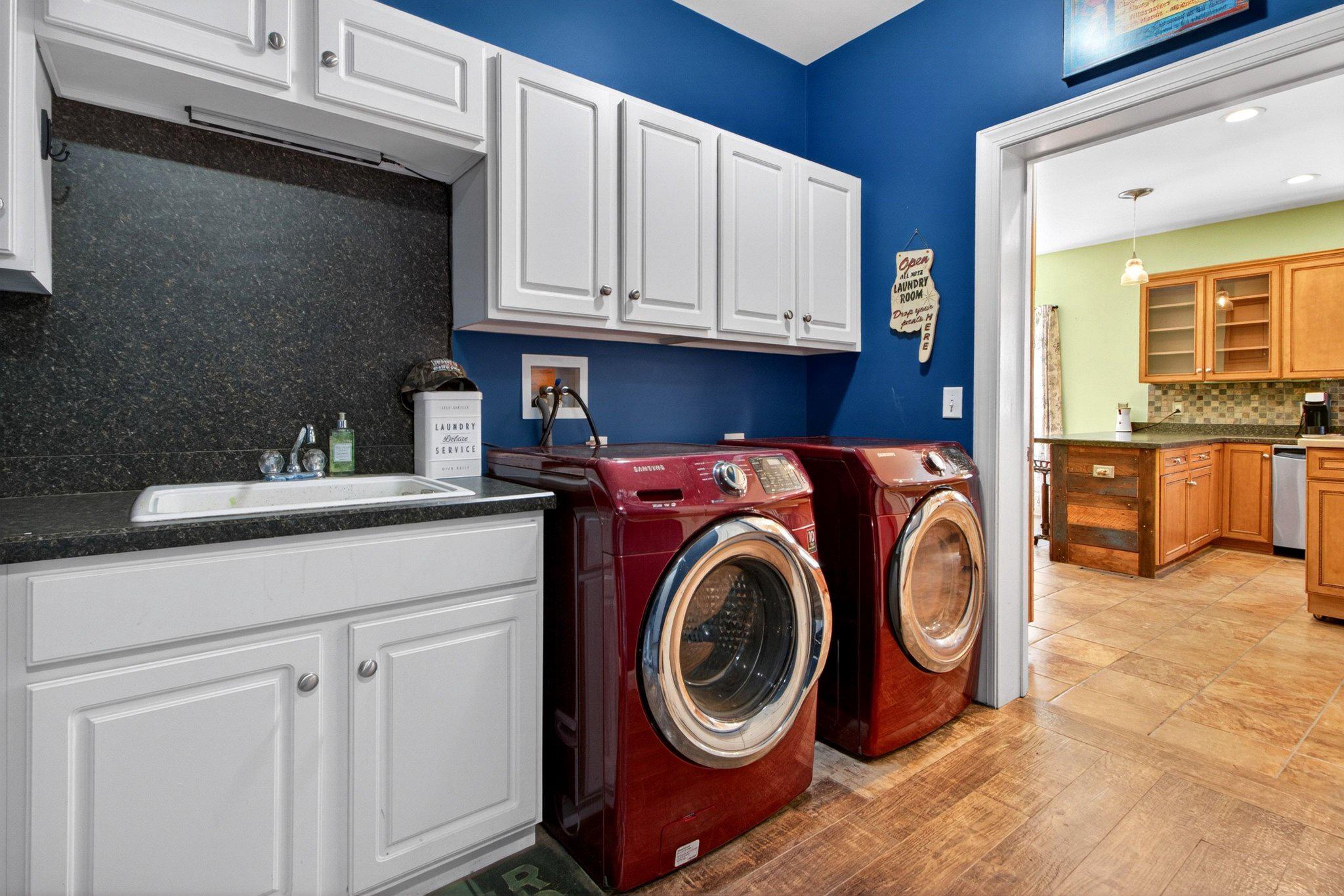 10878 Memory Road Harrington, DE 19952 - Photo 44 of 94 Chic laundry space with vibrant hues.