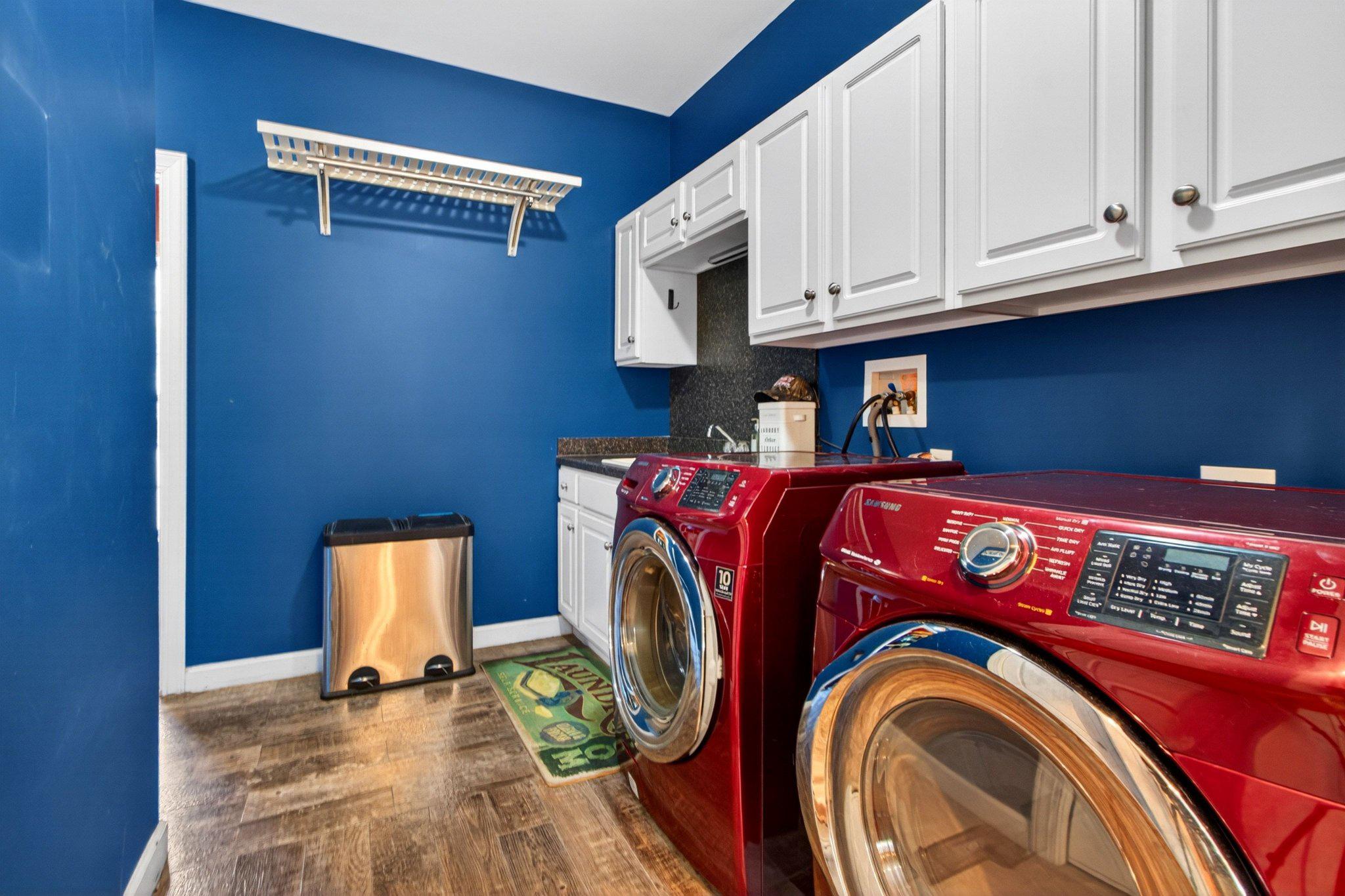 10878 Memory Road Harrington, DE 19952 - Photo 45 of 94 Vibrant laundry room with modern flair.