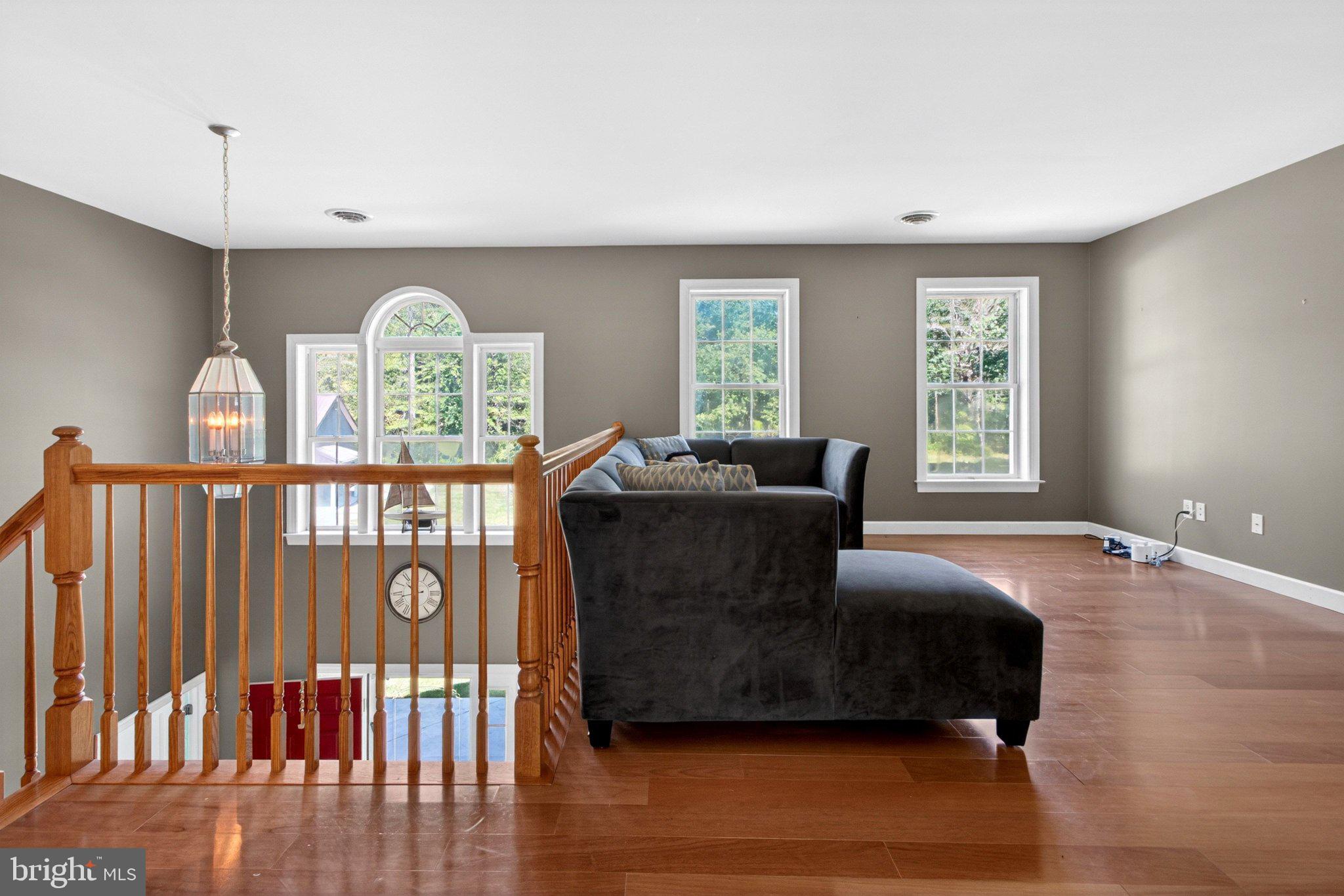 10878 Memory Road Harrington, DE 19952 - Photo 46 of 94 a living room with furniture and windows