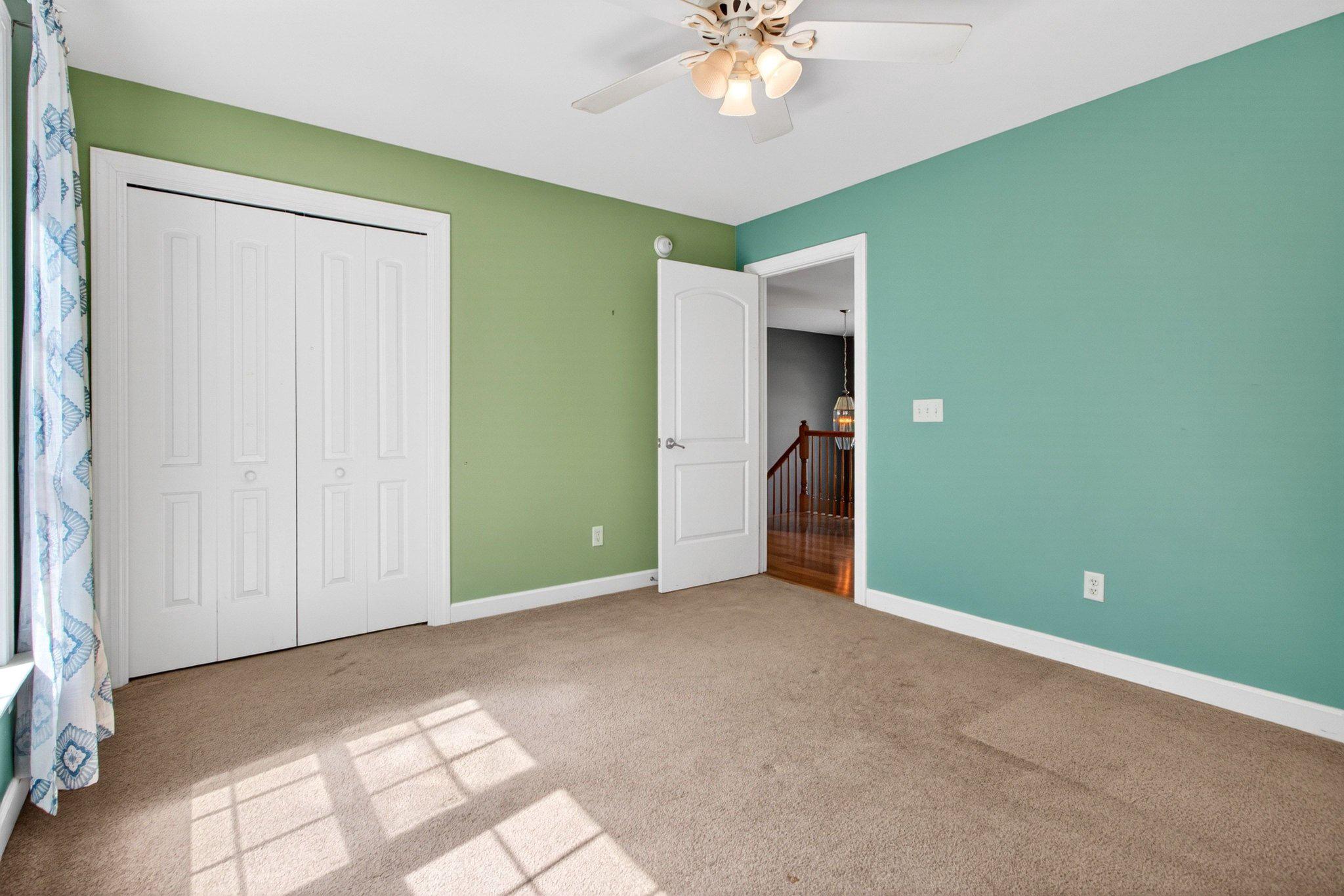 10878 Memory Road Harrington, DE 19952 - Photo 54 of 94 Bright and airy green bedroom space.