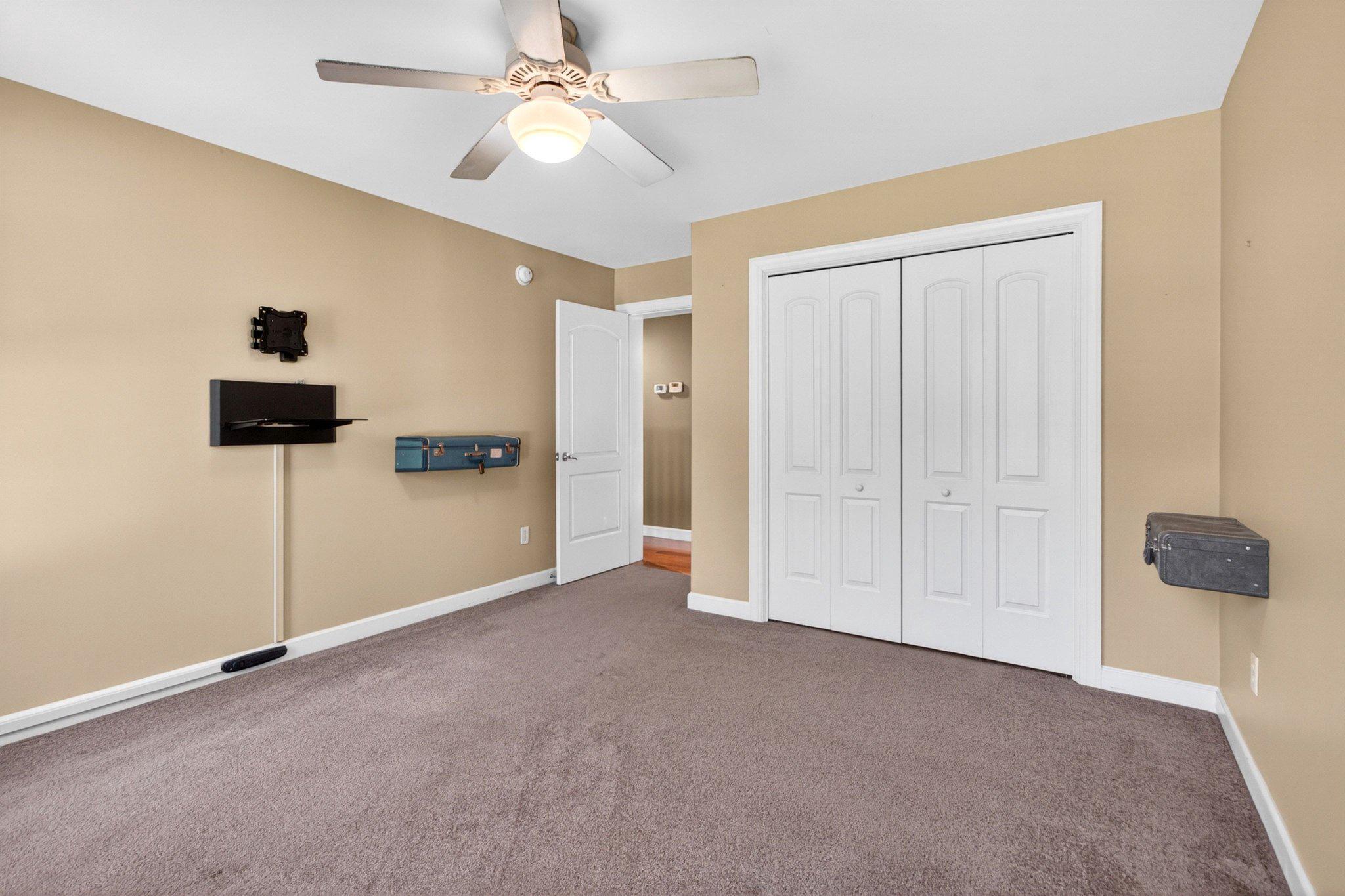 10878 Memory Road Harrington, DE 19952 - Photo 56 of 94 a view of empty room with ceiling fan