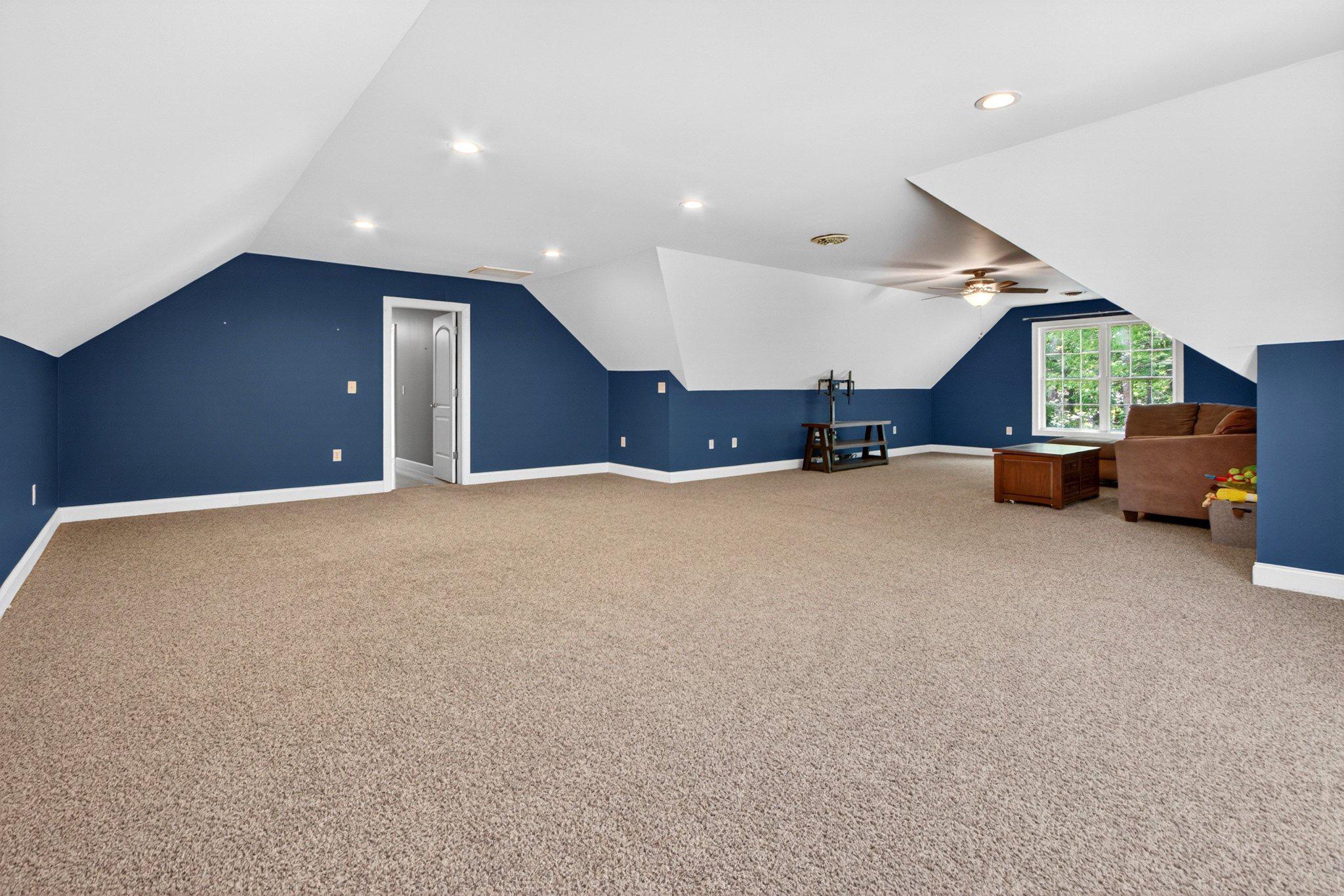 10878 Memory Road Harrington, DE 19952 - Photo 61 of 94 Spacious attic retreat with blue accents.
