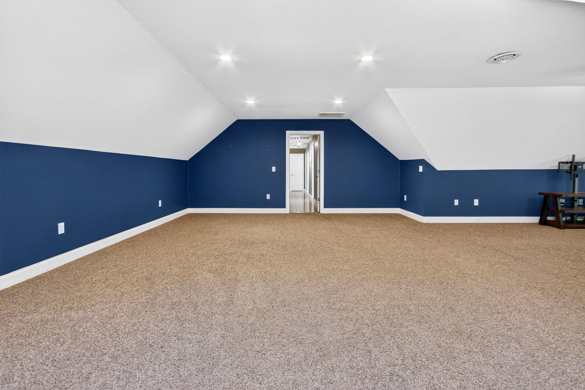 10878 Memory Road Harrington, DE 19952 - Photo 62 of 94 Spacious attic retreat with blue accents.