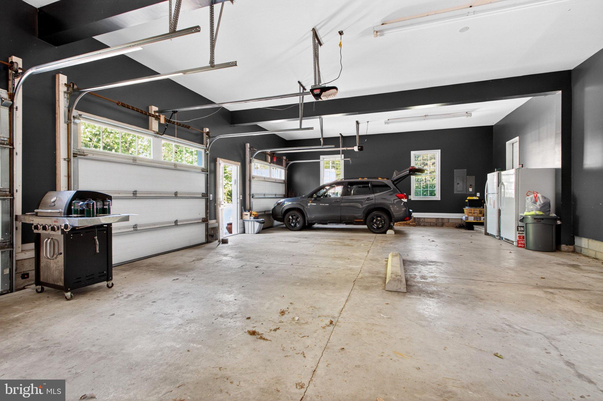 10878 Memory Road Harrington, DE 19952 - Photo 71 of 94 Spacious modern garage with natural light.