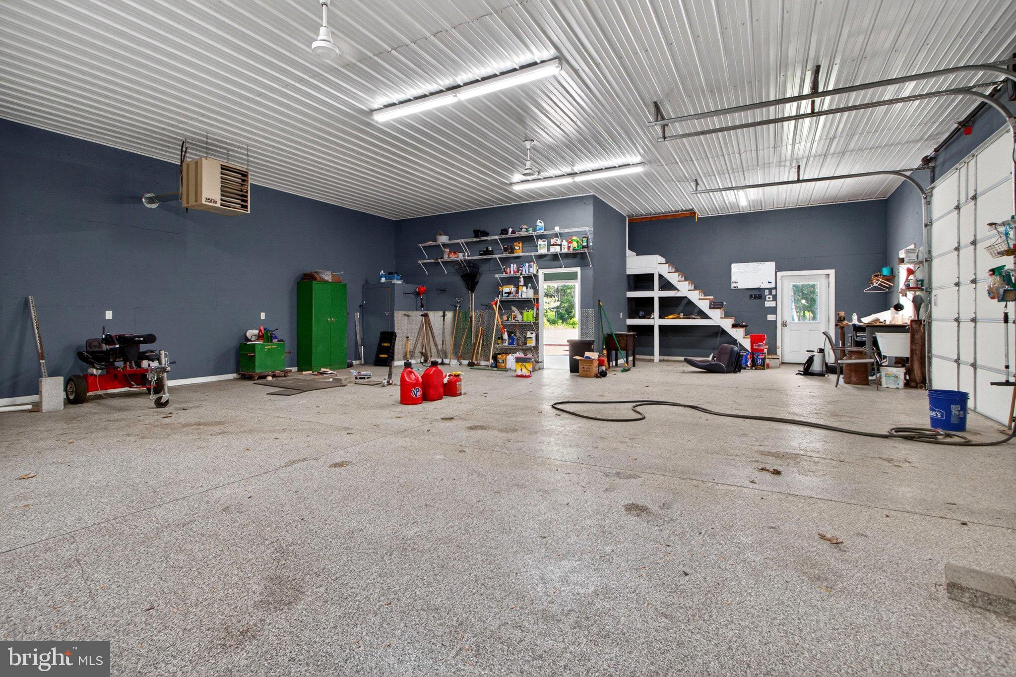 10878 Memory Road Harrington, DE 19952 - Photo 77 of 94 Spacious garage with modern finishes.
