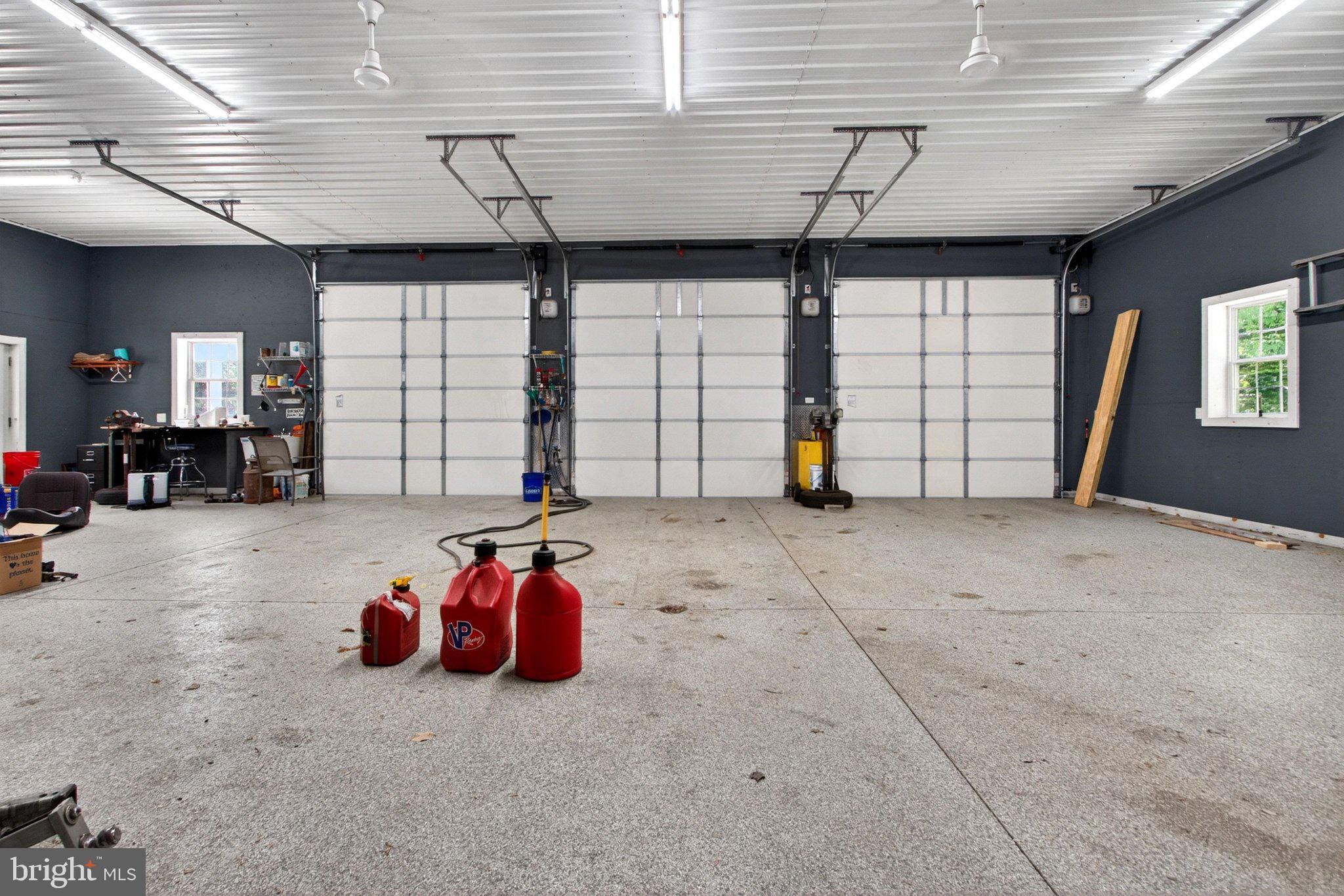 10878 Memory Road Harrington, DE 19952 - Photo 79 of 94 Spacious garage with modern finishes.