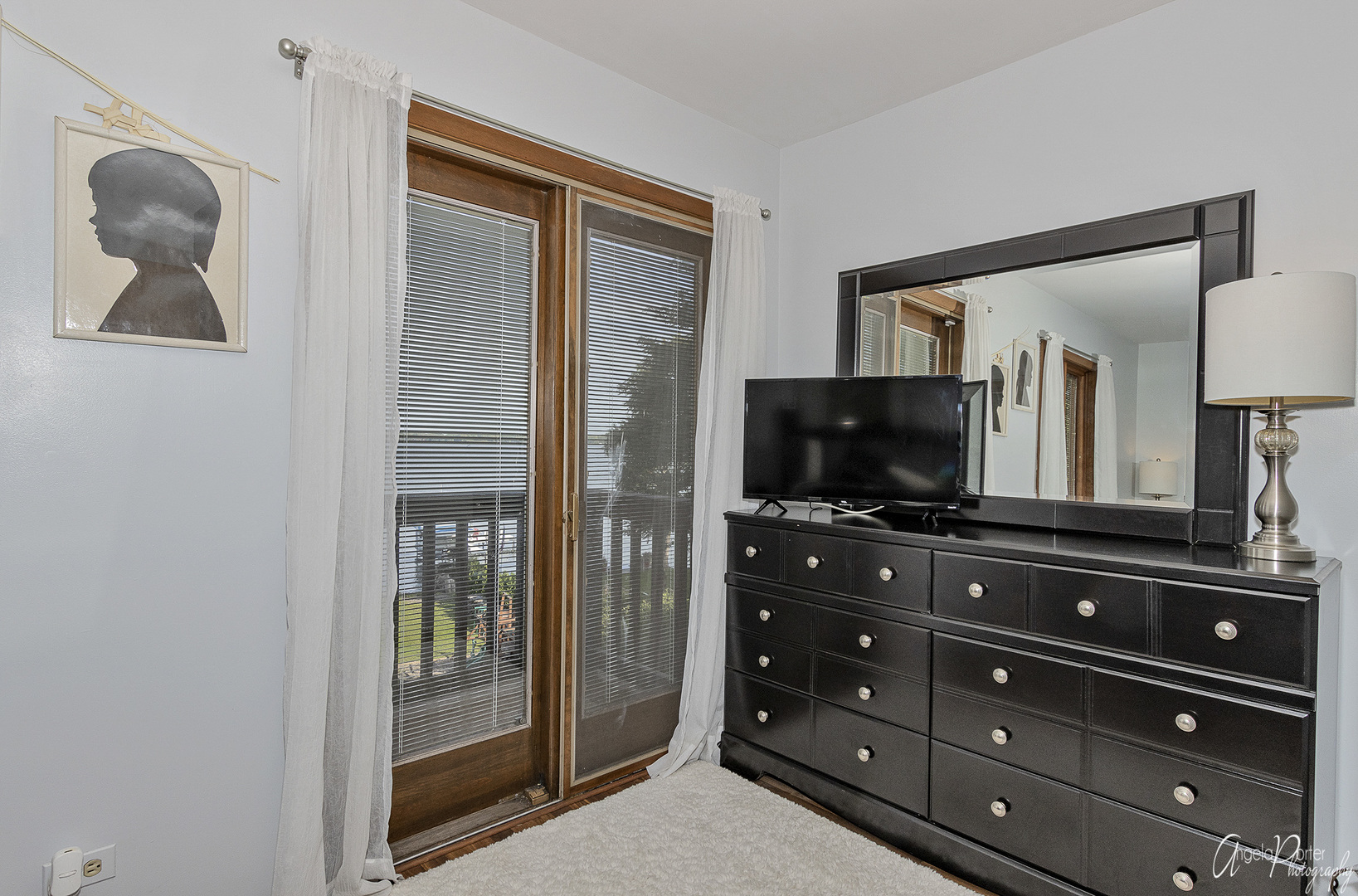 520 Bald Knob Road Johnsburg, IL 60051 - Photo 26 of 53 a living room with furniture and a flat screen tv