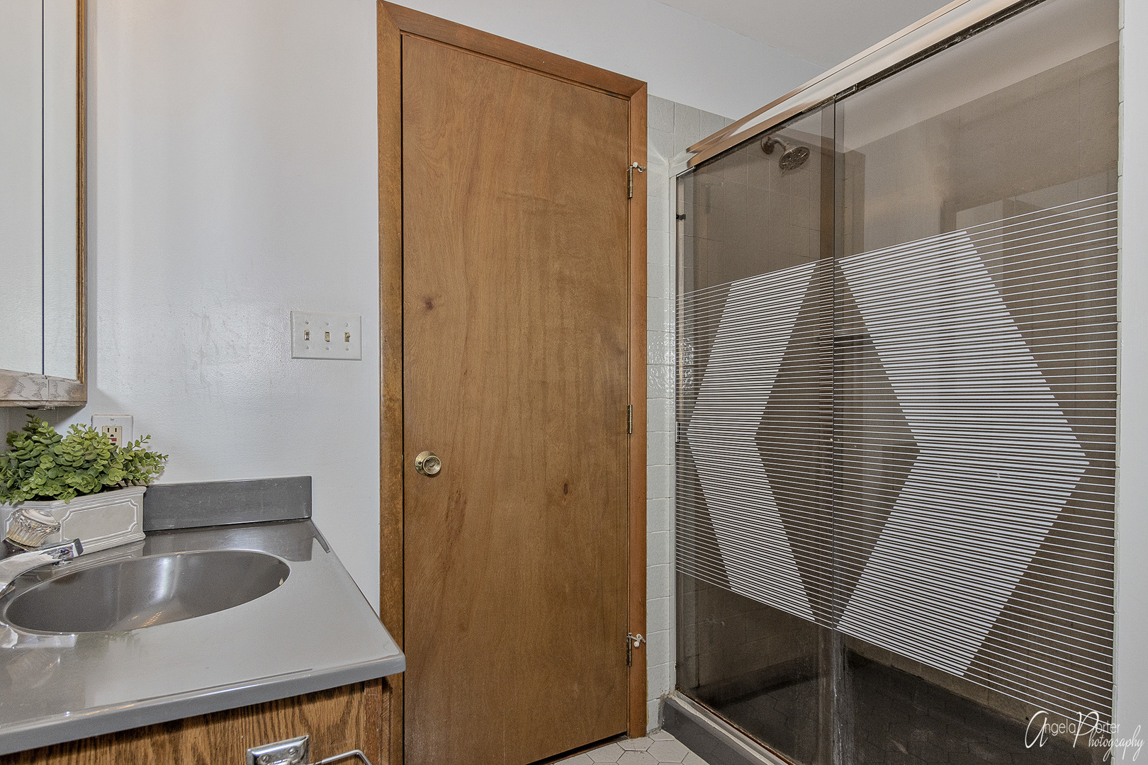 520 Bald Knob Road Johnsburg, IL 60051 - Photo 30 of 53 a bathroom with a sink and a mirror