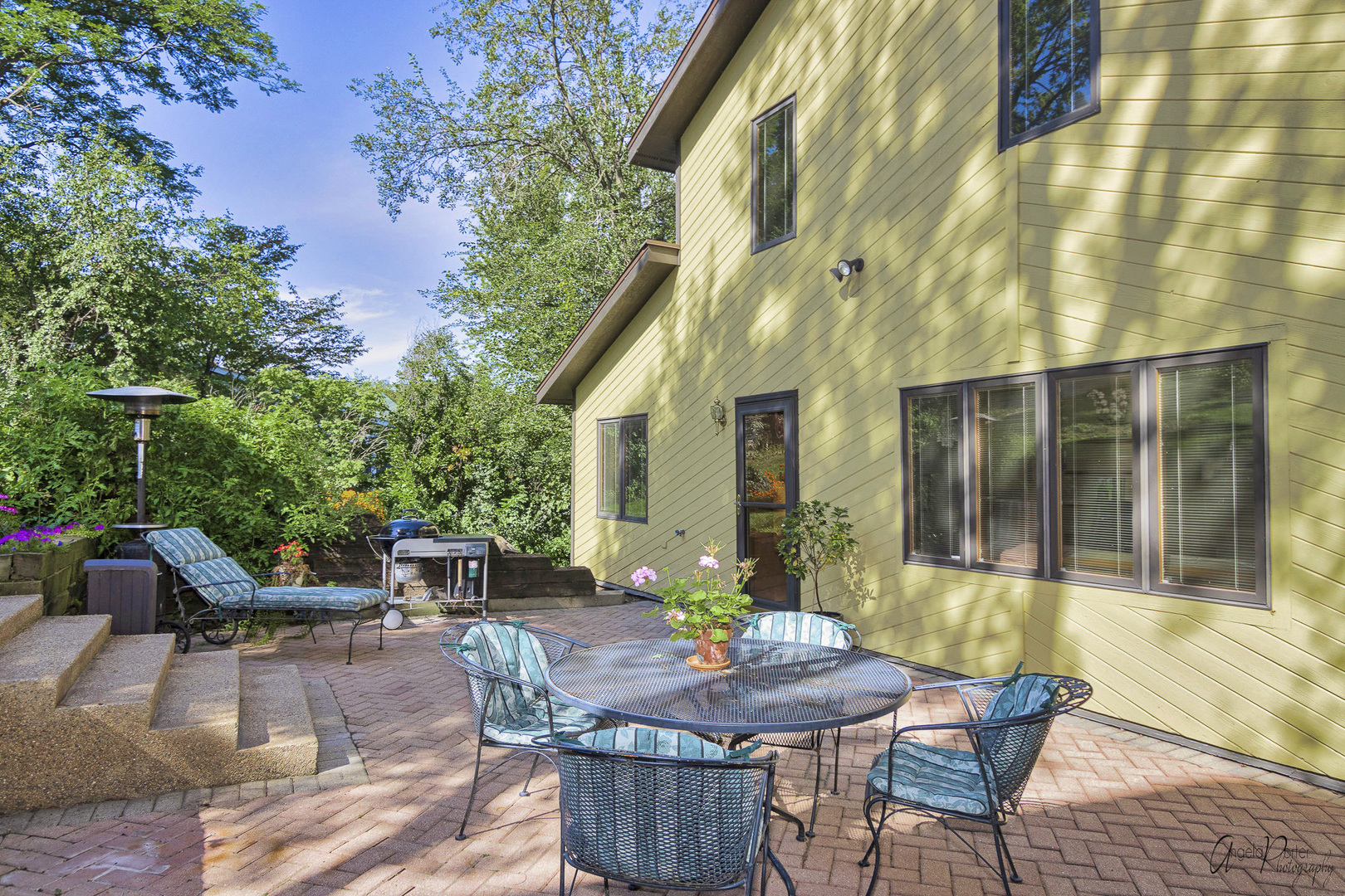 520 Bald Knob Road Johnsburg, IL 60051 - Photo 44 of 53 a view of a patio with table and chairs and potted plants