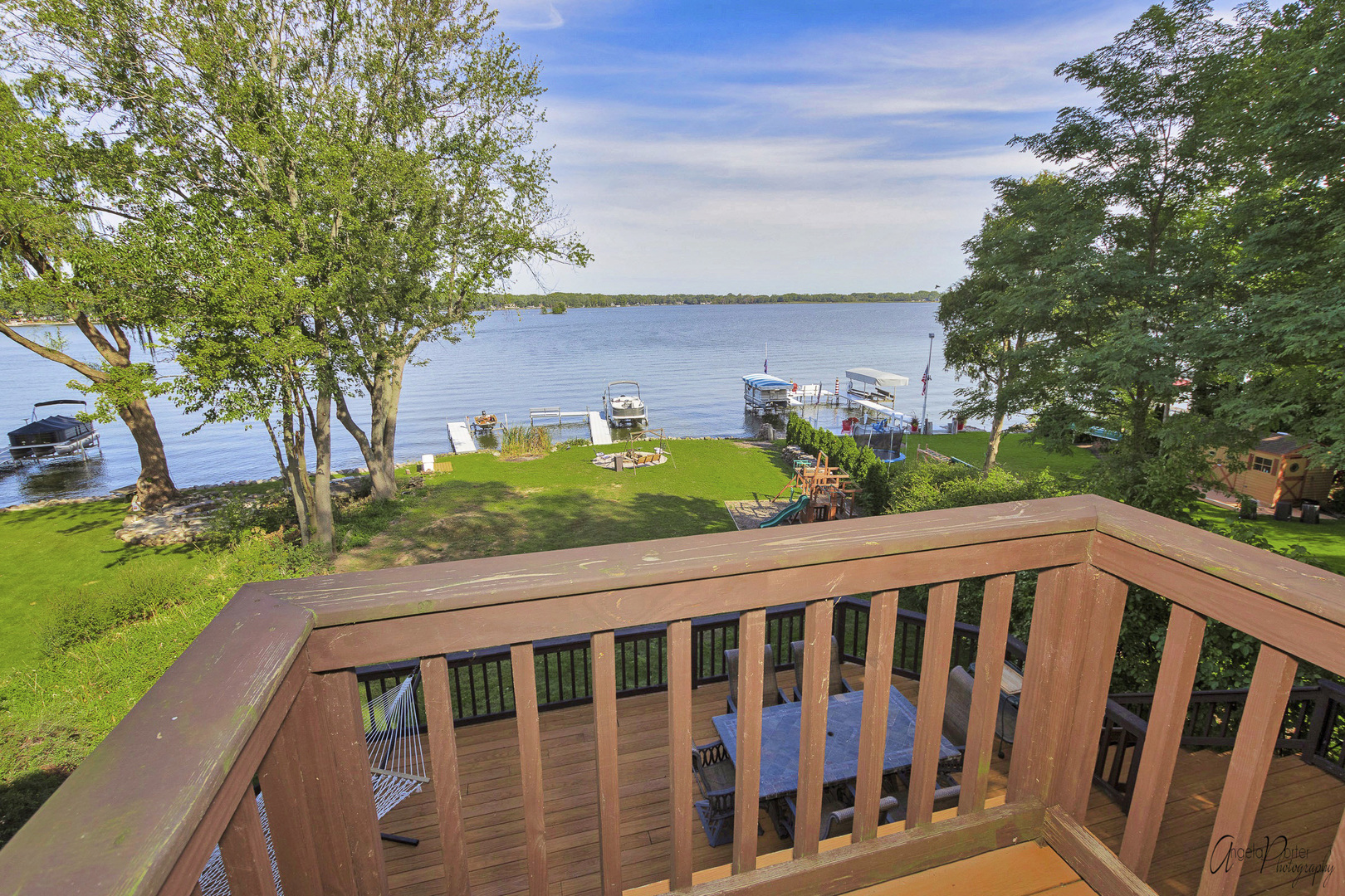 520 Bald Knob Road Johnsburg, IL 60051 - Photo 9 of 53 a view of a wooden deck with a backyard