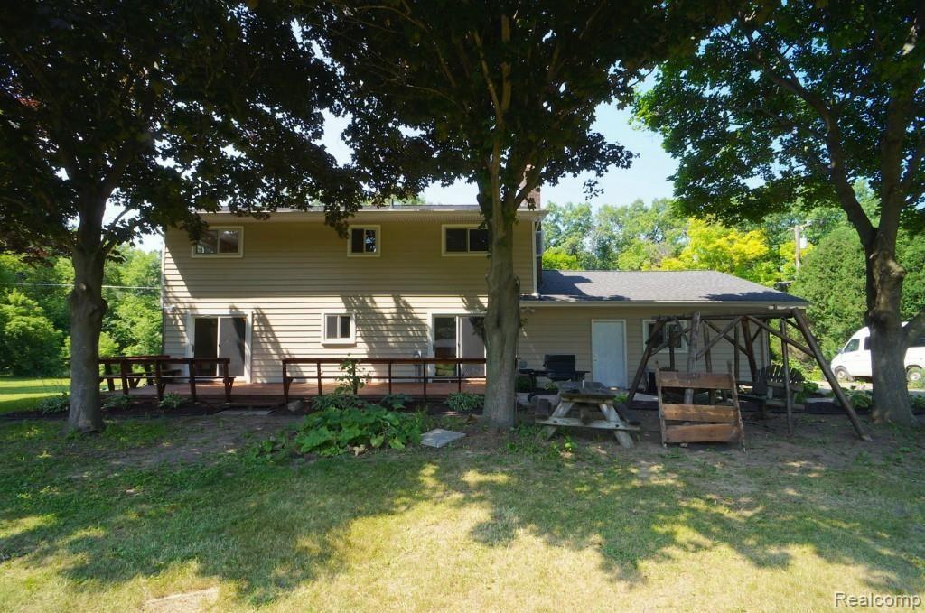 900 East Dawson Road Milford, MI 48381 - Photo 19 of 20 33x12 Deck Across Back of Home