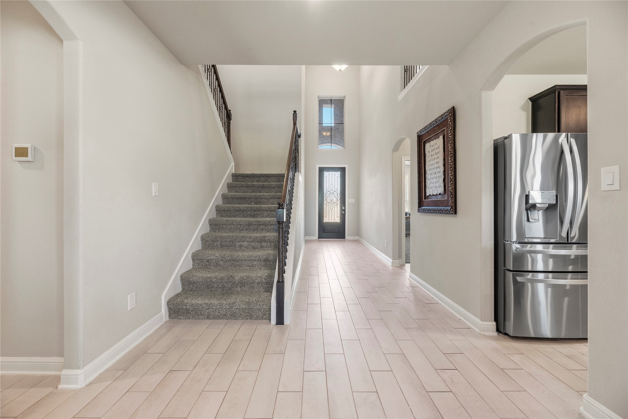 3319 Learning Tree Lane Rosenberg, TX 77471 - Photo 24 of 44 Neutral tones throughout the home create an understated designer touch. Creamy vanilla hues coalesce with bright white trim and rustic wood in a delicious blend of interior perfection.