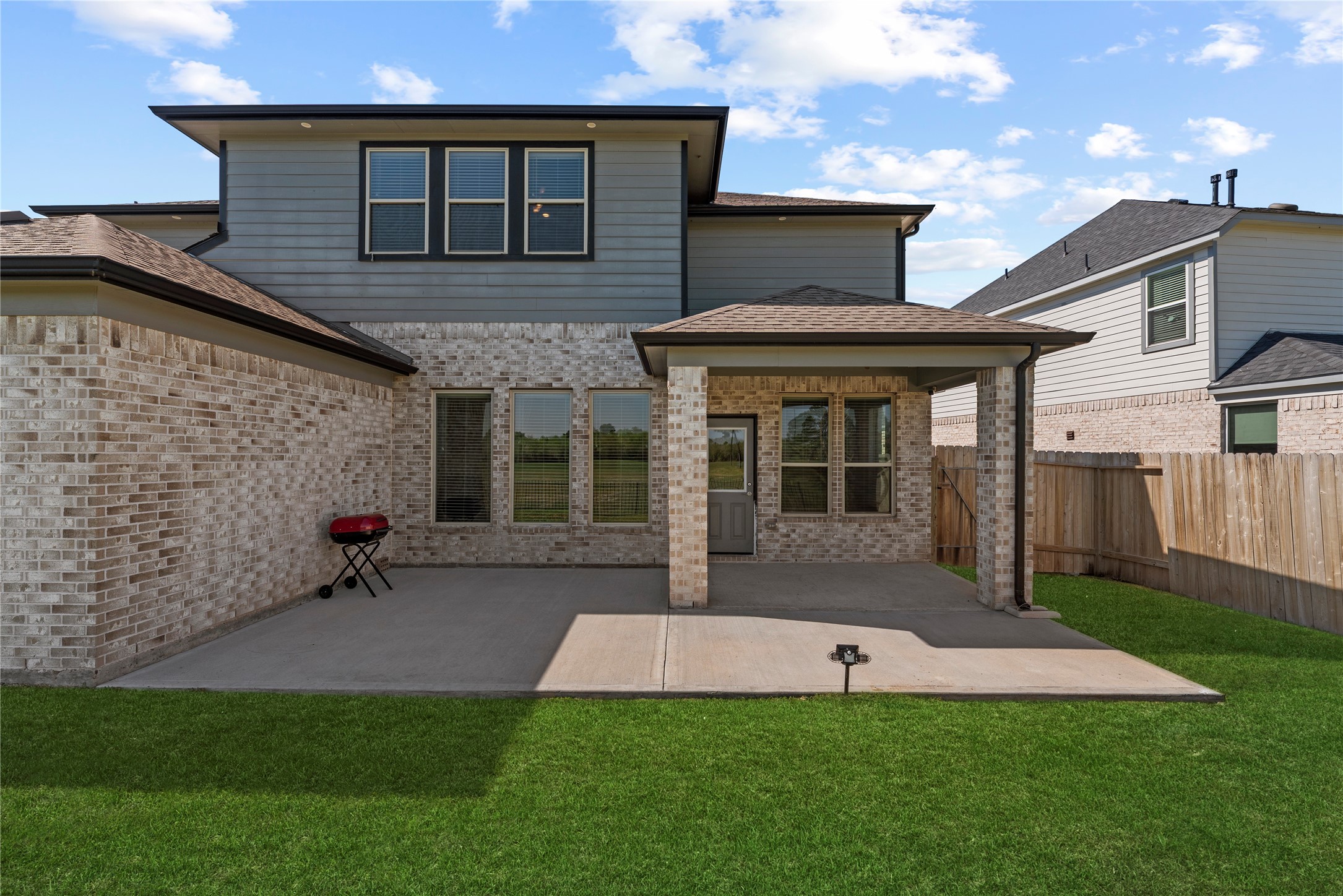 3319 Learning Tree Lane Rosenberg, TX 77471 - Photo 39 of 44 Sip morning coffee on the covered patio as you listen to your favorite Podcast or mix up your routine and grill breakfast sausages for the entire family to enjoy.