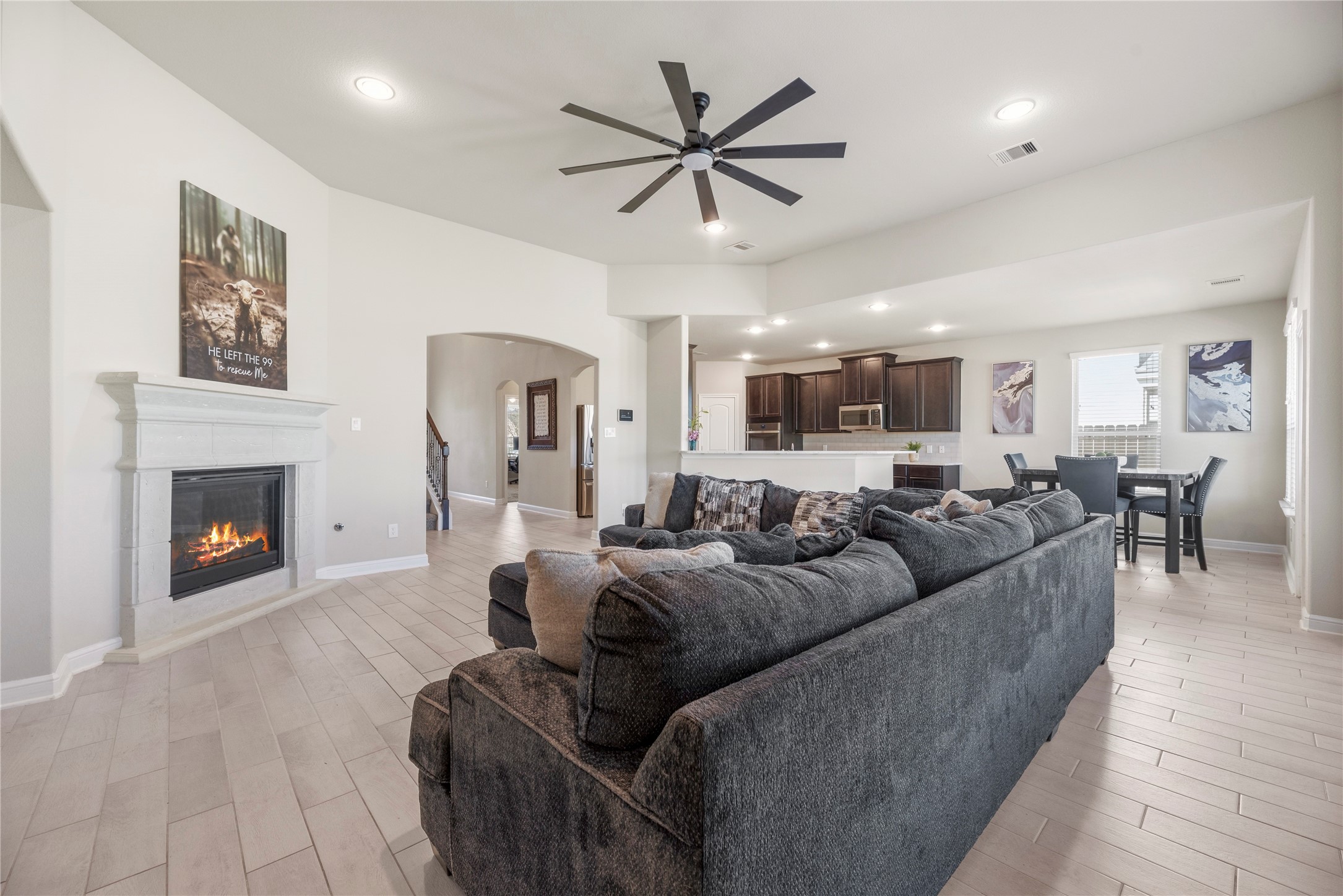 3319 Learning Tree Lane Rosenberg, TX 77471 - Photo 44 of 44 Effortlessly entertain in this inviting home with an open floor plan, where you can enjoy the game in the cozy living room while guests mingle in the spacious kitchen over a delicious spread.