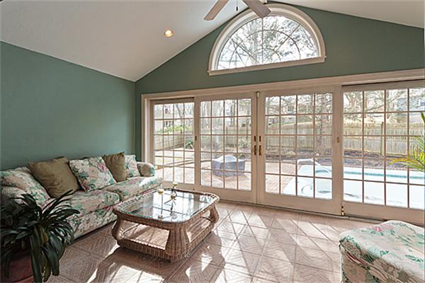 14 Apache Trail Arlington, MA 02474 - Photo 12 of 29 a living room with furniture and a large window