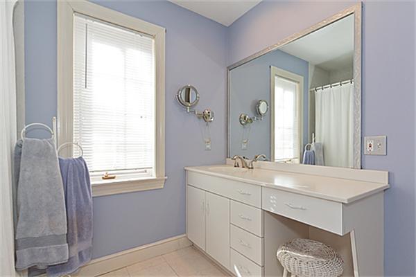 14 Apache Trail Arlington, MA 02474 - Photo 18 of 29 a view with cabinet a mirror and a sink