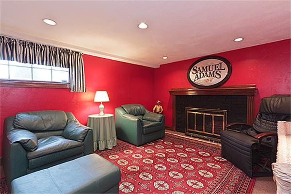 14 Apache Trail Arlington, MA 02474 - Photo 23 of 29 a living room with furniture and a fireplace