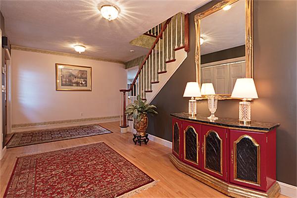 14 Apache Trail Arlington, MA 02474 - Photo 5 of 29 a view of staircase with a rug