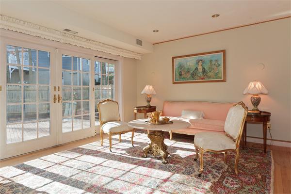 14 Apache Trail Arlington, MA 02474 - Photo 7 of 29 a living room with furniture and a window