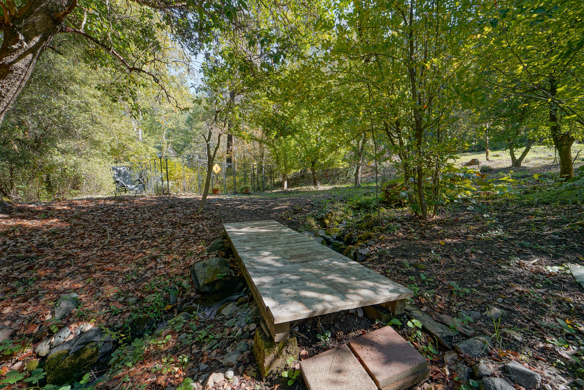 420 Price Creek Road Big Bar, CA 96010 - Photo 16 of 63 a view of a backyard with chairs