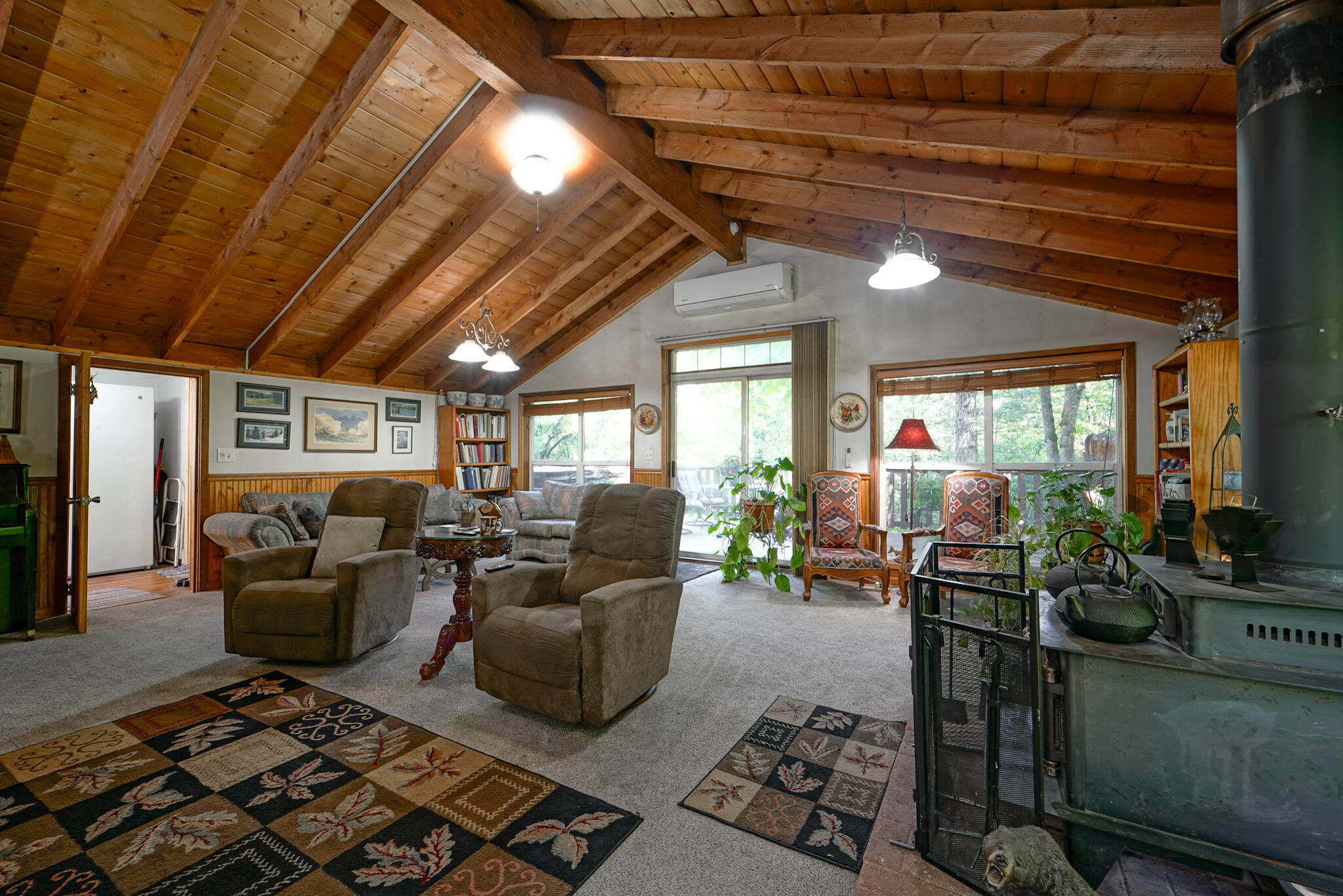 420 Price Creek Road Big Bar, CA 96010 - Photo 19 of 63 a living room with furniture and a flat screen tv