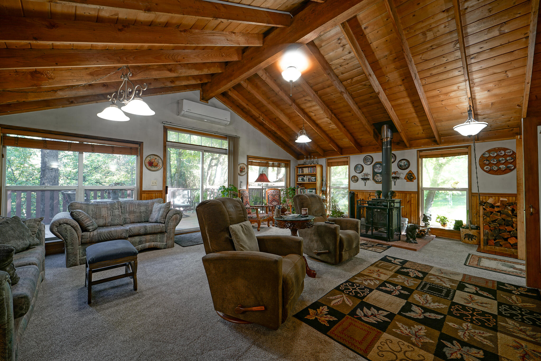 420 Price Creek Road Big Bar, CA 96010 - Photo 21 of 63 a living room with furniture ceiling fan and a rug
