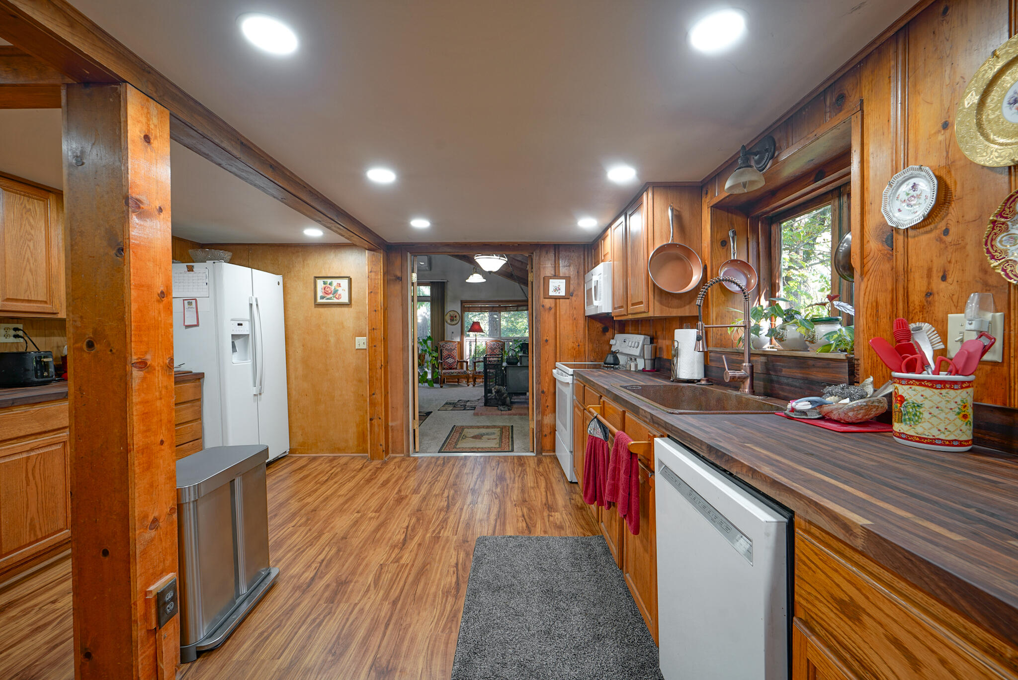 420 Price Creek Road Big Bar, CA 96010 - Photo 26 of 63 a large kitchen with stainless steel appliances granite countertop a lot of counter space and a dining table